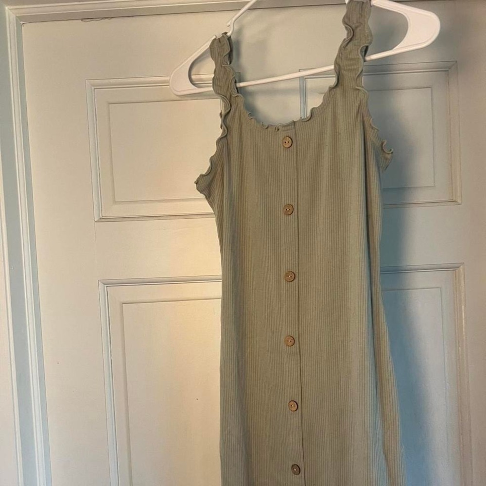 Green midi dress with button-up detail and lettuce trim